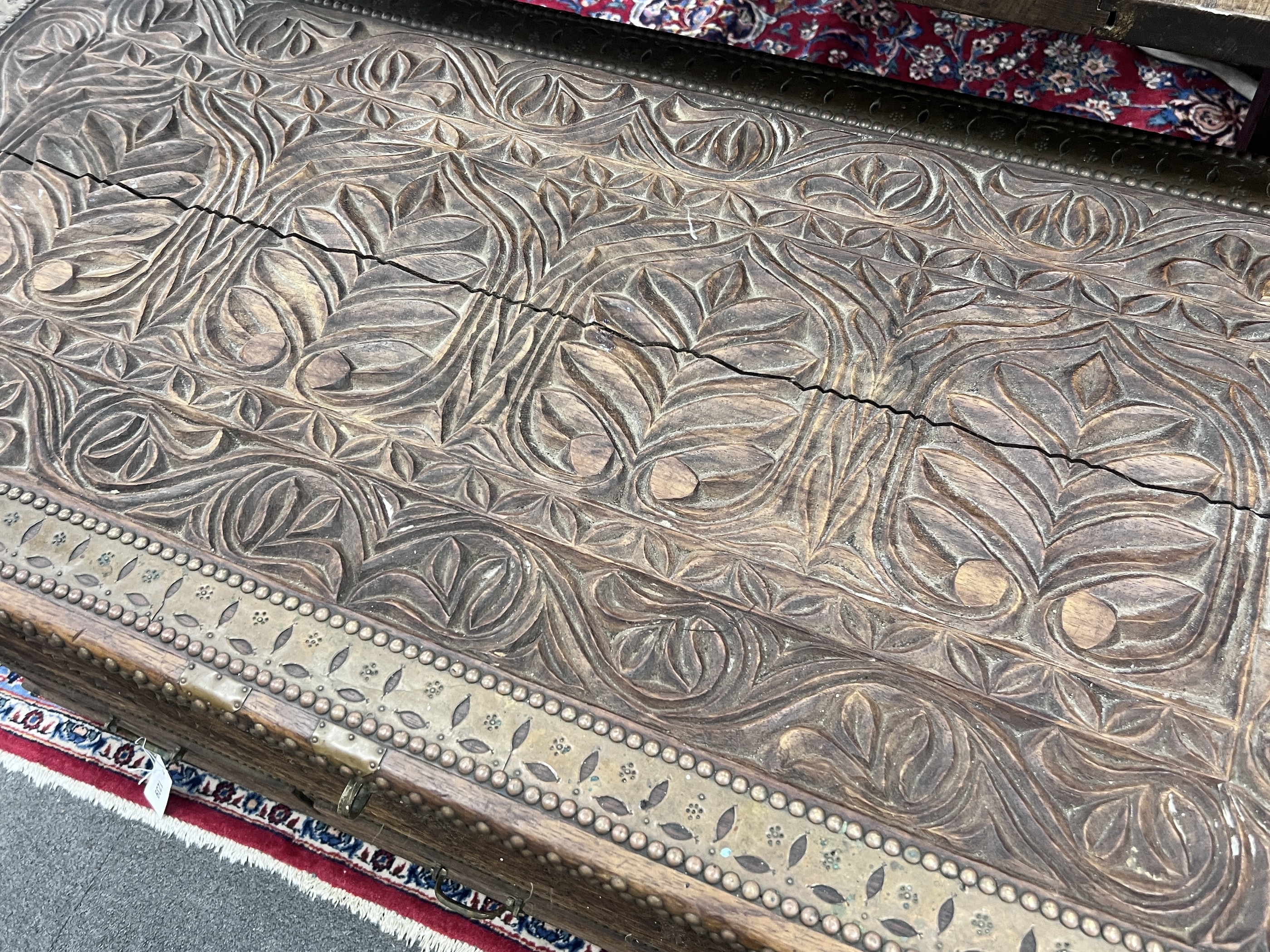 A brass mounted carved hardwood Zanzibar chest, width 110cm, depth 54cm, height 61cm